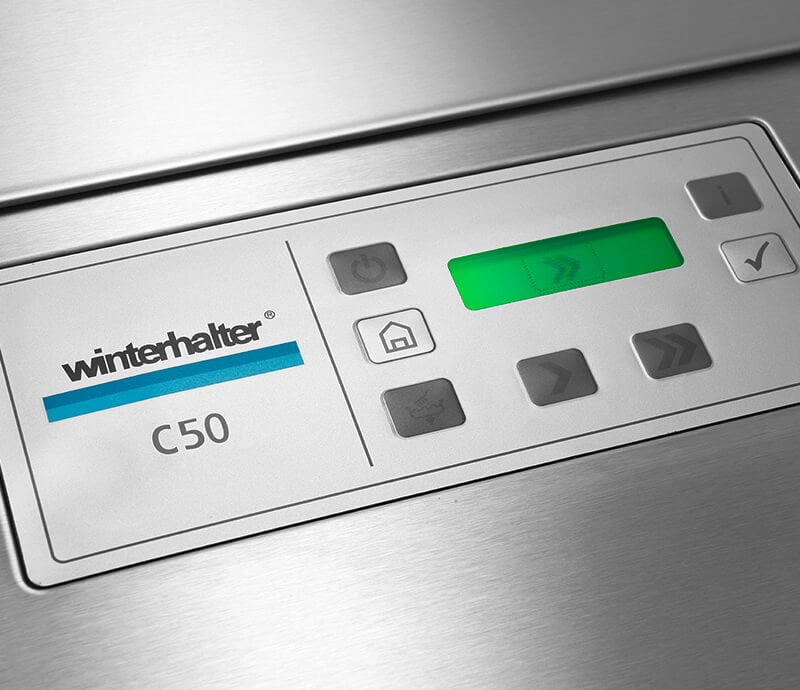 Language-Neutral display on Winterhalter C50 rack conveyor dishwasher Language-Neutral display on Winterhalter C50 rack conveyor dishwasher