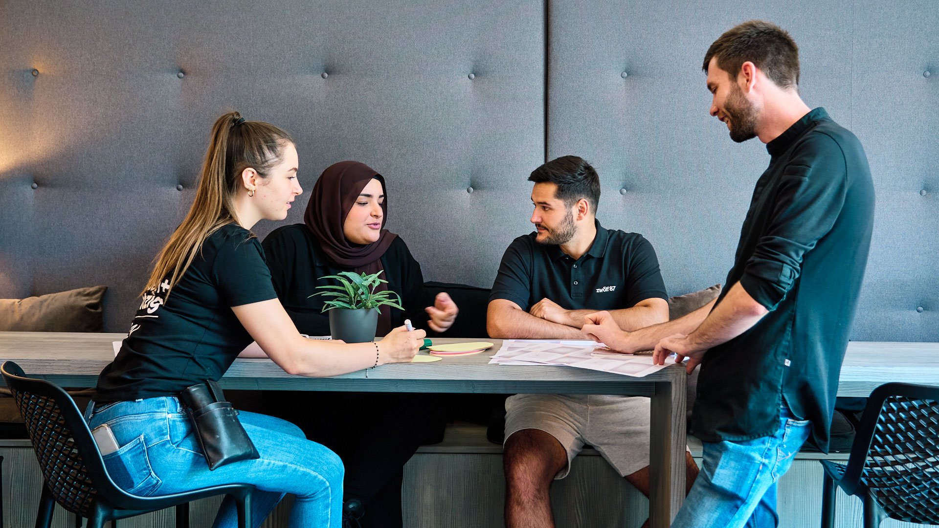 Tip 4: Analyze and solve problems A young restaurateur is in a team meeting with three employees